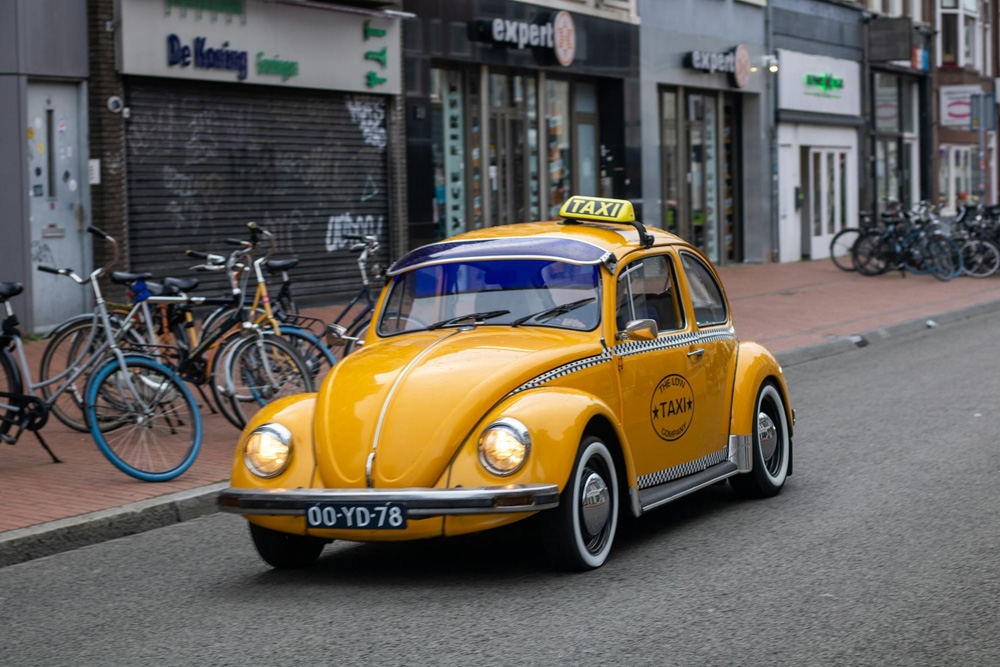 VW Vocho in yellow parked