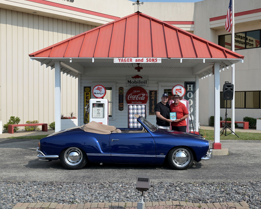 Classic convertible showcased at the Yager and Sons display during Funfest