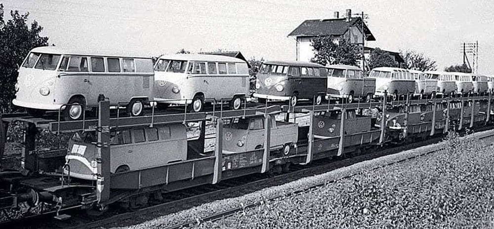 A delivery of new Transporter Combis, pickup trucks and Samba buses from Volkswagenwerk Hannover, pictured somewhere in the Netherlands