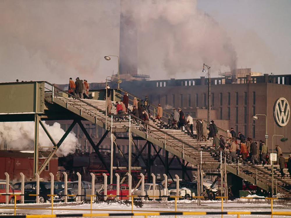 In 
        1961 Volkswagen employees are climbing the steps of the pedestrian bridge